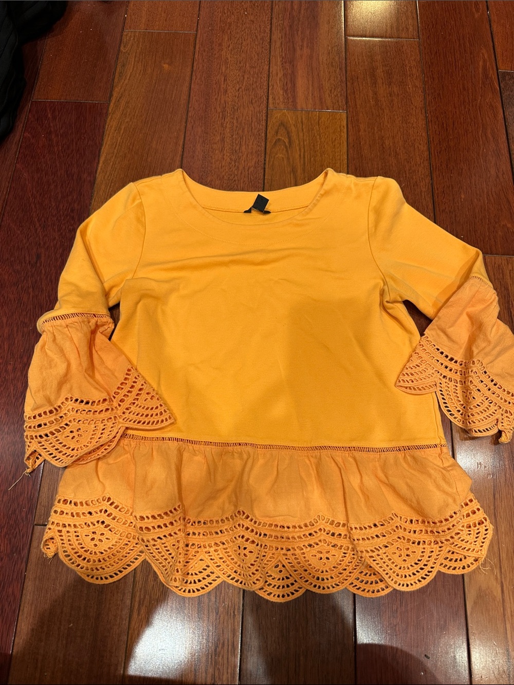 Orange peplum top